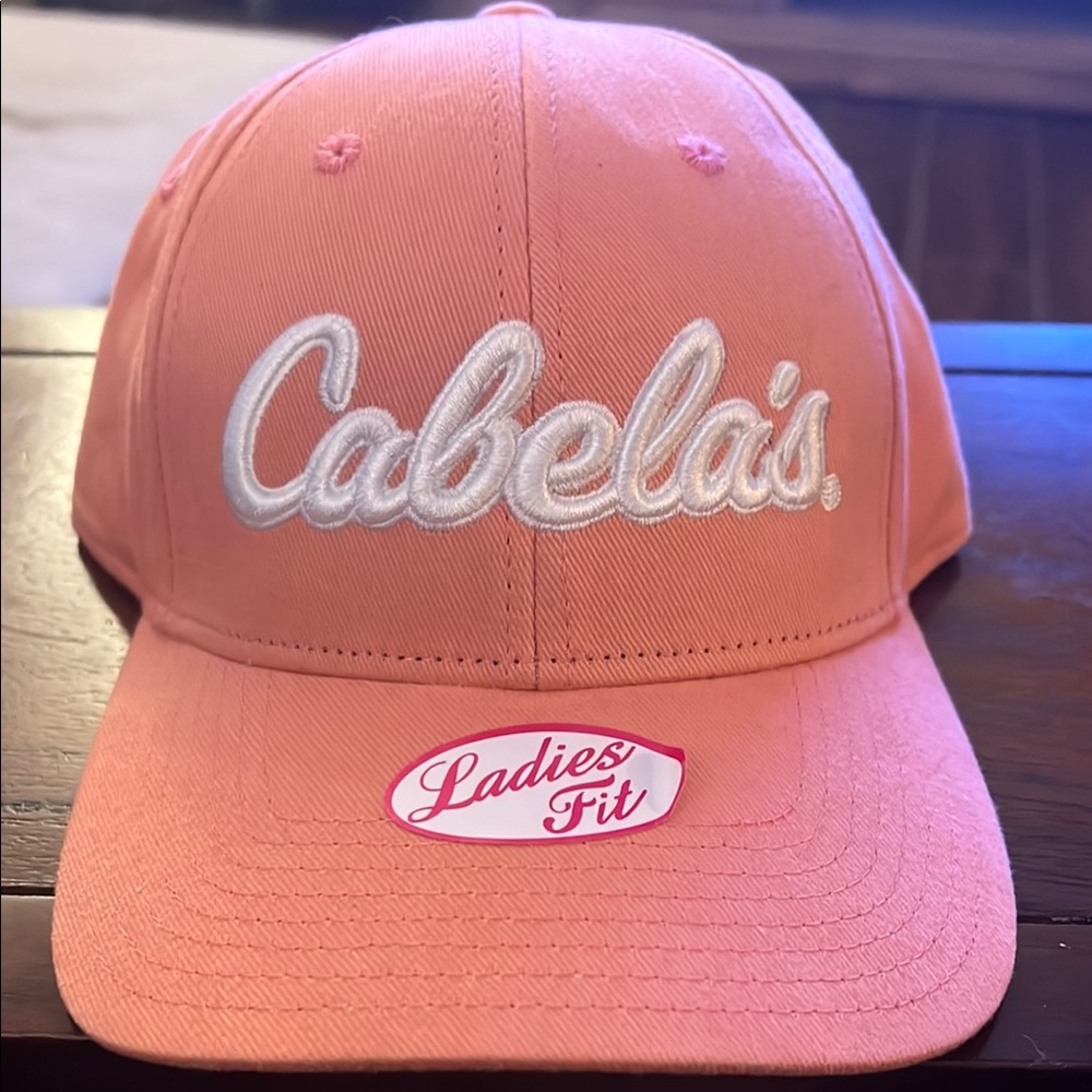 NWT Cabela Ladies fit hat. OSFM. Coral color. Cotton/polyester mix.